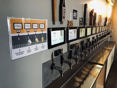 pour-it-yourself taps from a bar in San Francisco